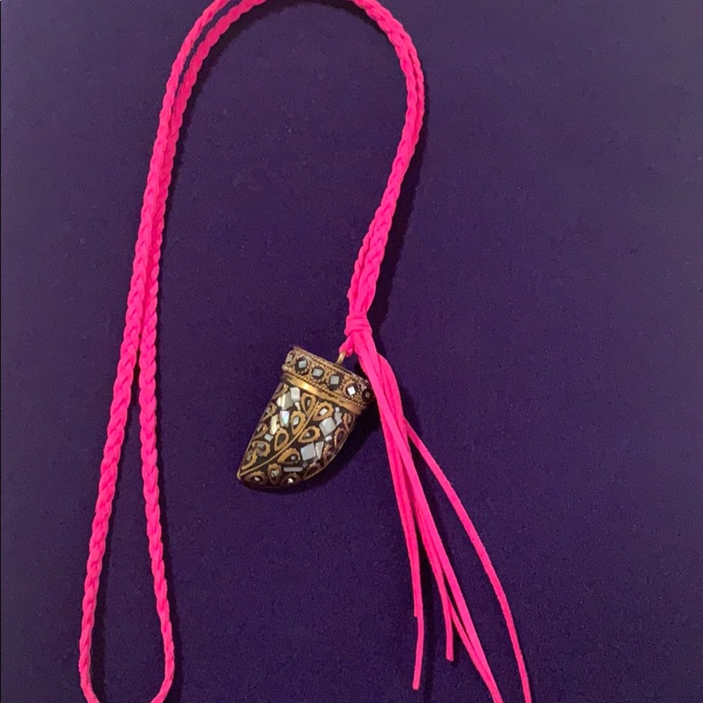 Leather braided necklace with horn pendant